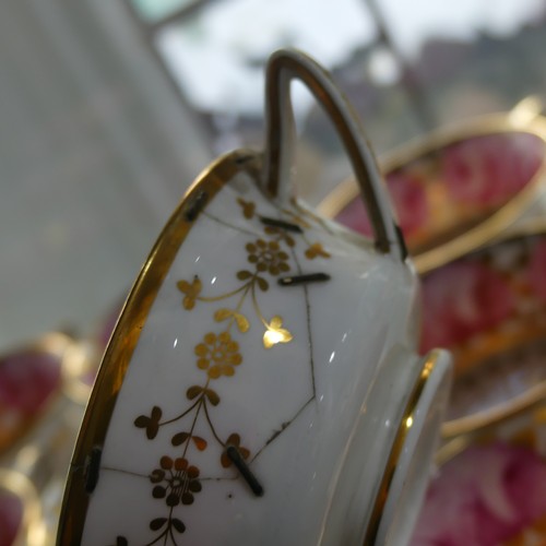 76 - A Spode 'Cabbage Rose' pattern Tea Service, for twelve-place setting including twelve Summer Cups, o... 