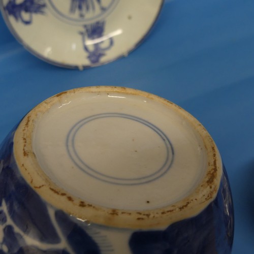 166 - Two Chinese blue and white Ginger Jars, with prunus flower pattern, H 14cm, together with an orienta... 