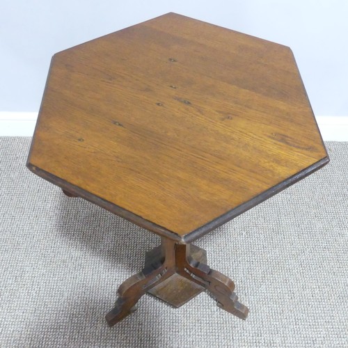 434 - An early 20thC oak Gothic-style Plant Stand, with hexagonal top, raised on tripod stem, W 46cm x D46... 