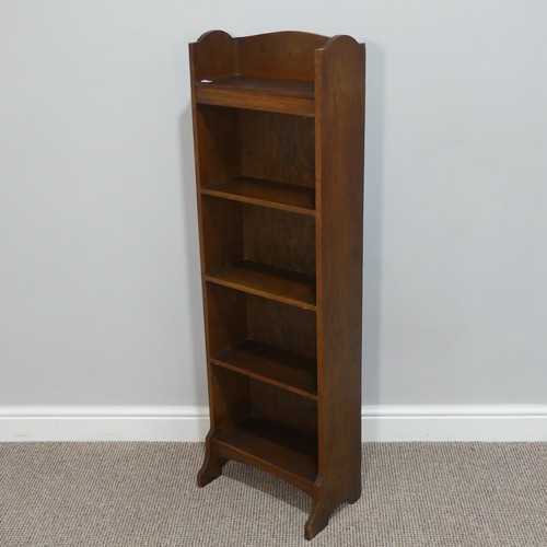 437 - An Arts & Crafts oak narrow open Bookcase, raised on sledged feet with galleried top, W 38cm x H... 