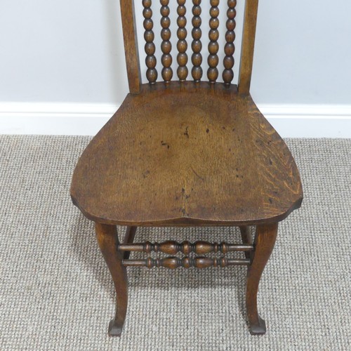 443 - An Arts & Crafts oak bobbin-turned spindle back Hall Chair, W 43cm x H 101cm x D 41cm.... 