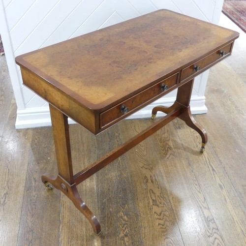 444 - A good quality reproduction burr walnut Sofa Table, the quarter-veneered top edged with cross bandin... 