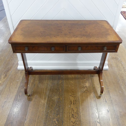 444 - A good quality reproduction burr walnut Sofa Table, the quarter-veneered top edged with cross bandin... 