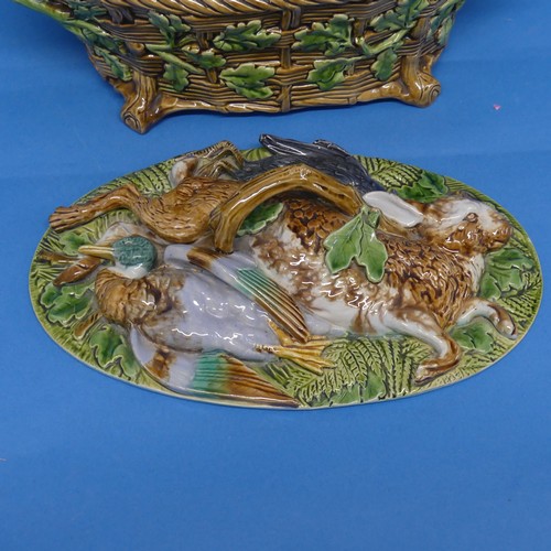 105 - A Minton majolica Game Pie Dish and Cover, late 19thC, the lid modelled as game resting on ferns and... 