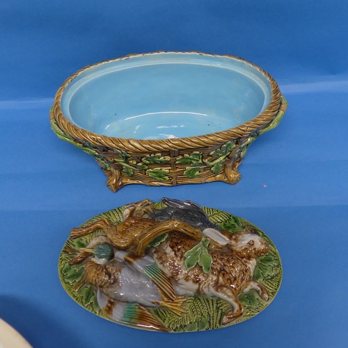 105 - A Minton majolica Game Pie Dish and Cover, late 19thC, the lid modelled as game resting on ferns and... 