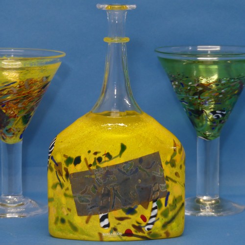 107 - A Kosta Boda art glass Decanter, the body in yellow with splashes of other colours, together with tw... 