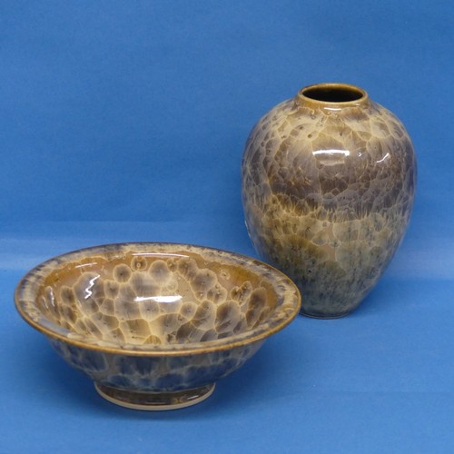 109 - A small studio pottery Bowl by Maurice Young, together with corresponding Vase, and a tray by Andrew... 