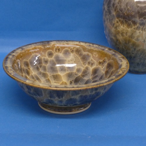 109 - A small studio pottery Bowl by Maurice Young, together with corresponding Vase, and a tray by Andrew... 