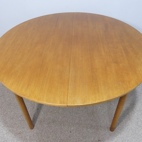 469 - A retro teak extending circular Dining Table and six Dining Chairs by A H McIntosh & Co., the ta... 