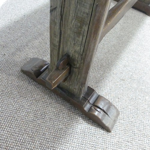 474 - An antique oak plank top Refectory Table, the top with cleated ends, timber is in an overall worn co... 