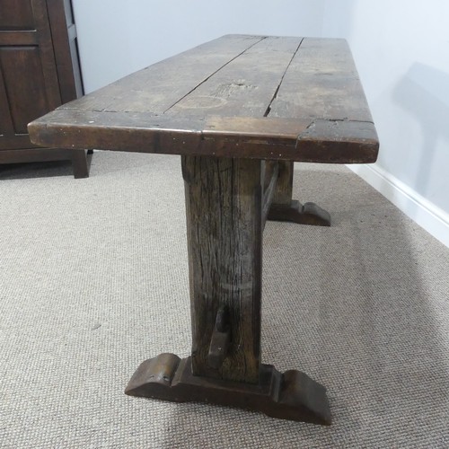 474 - An antique oak plank top Refectory Table, the top with cleated ends, timber is in an overall worn co... 