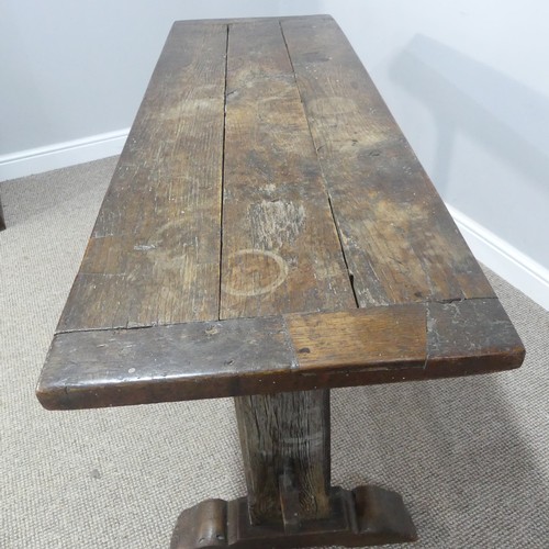 474 - An antique oak plank top Refectory Table, the top with cleated ends, timber is in an overall worn co... 