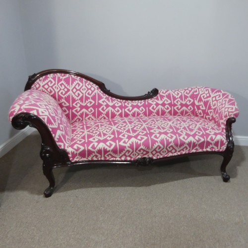 475 - A Victorian double ended serpentine-shaped Chaise Longue, with carved scrolling mahogany show frame ... 