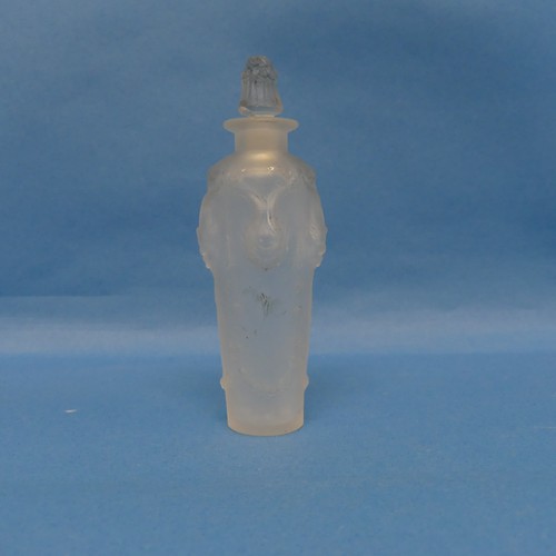 135 - A René Lalique pre-war 'Pan' glass Scent Bottle, model no. 504, with clear frosted glass, moulded bo... 