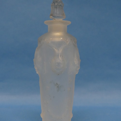 135 - A René Lalique pre-war 'Pan' glass Scent Bottle, model no. 504, with clear frosted glass, moulded bo... 