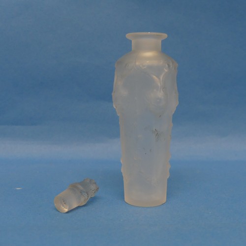 135 - A René Lalique pre-war 'Pan' glass Scent Bottle, model no. 504, with clear frosted glass, moulded bo... 