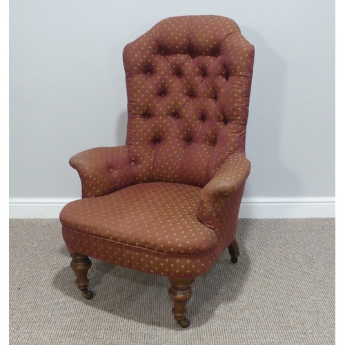 484 - A Victorian upholstered button-back Armchair, raised on turned legs and casters, some woodworm, W 71... 