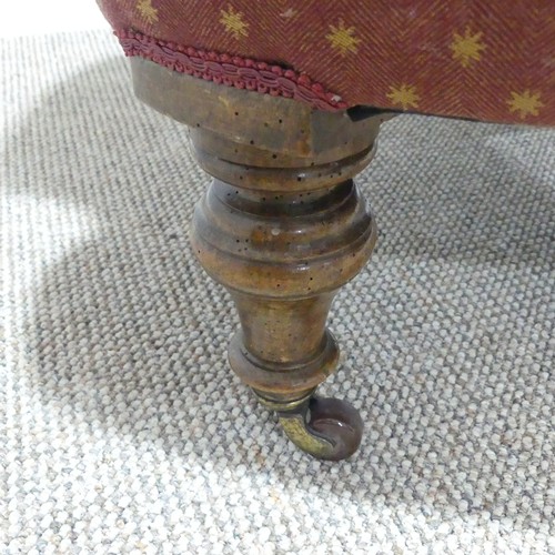 484 - A Victorian upholstered button-back Armchair, raised on turned legs and casters, some woodworm, W 71... 