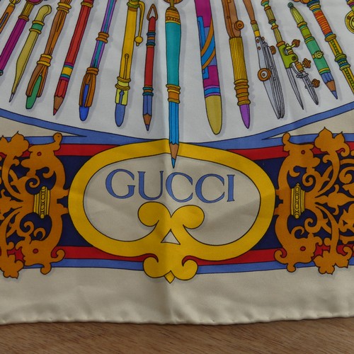 177 - A late 20thC Gucci silk Scarf 'Storia Della Matita', still with Gucci care label, hand-hemmed, a ver... 