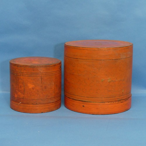 447 - An early 20thC orange lacquer Thai Tea Caddy, Diameter 21cm x H 20cm, together with another similar,... 