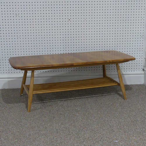 477 - An Ercol 'Blonde' beech and elm Coffee Table, with magazine rack undertier, L 114cm x D 45cm x H 37c... 