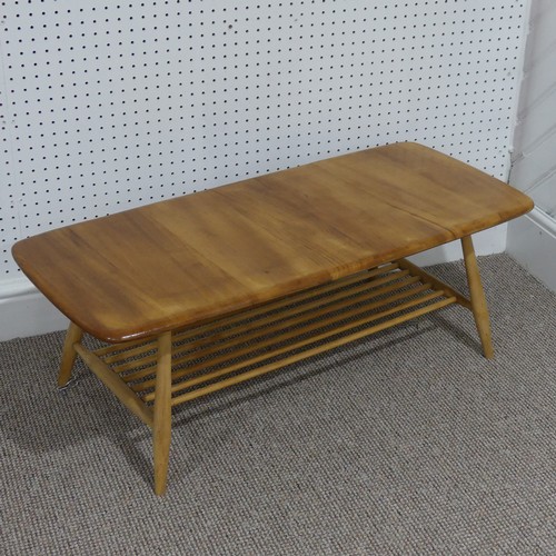 477 - An Ercol 'Blonde' beech and elm Coffee Table, with magazine rack undertier, L 114cm x D 45cm x H 37c... 