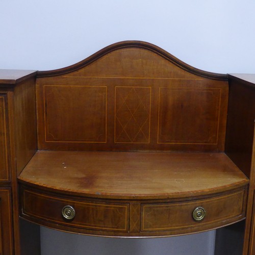 483 - An Edwardian mahogany bowfront pedestal Sideboard, with cellarette drawer and boxwood stringing, W 1... 