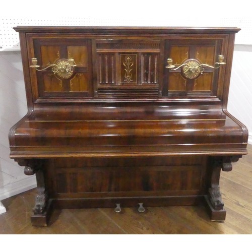 491 - A late Victorian Collard and Collard upright rosewood piano, with brass candle sconces and hinged mu... 