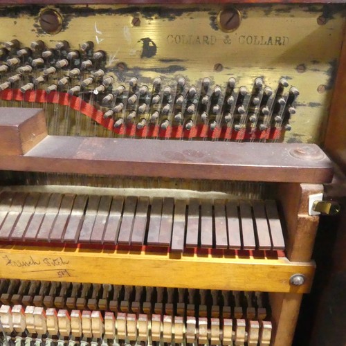 491 - A late Victorian Collard and Collard upright rosewood piano, with brass candle sconces and hinged mu... 