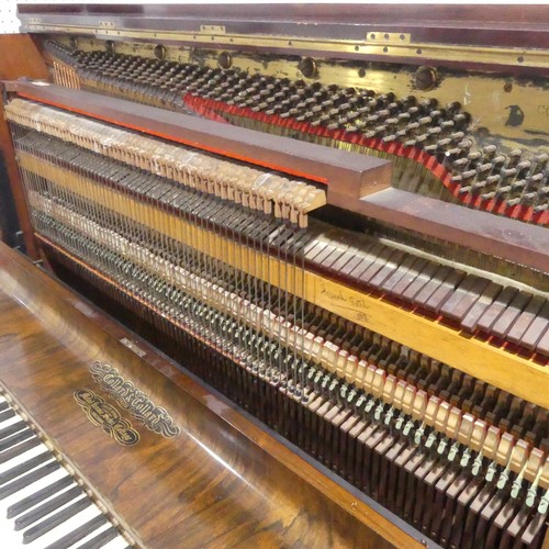 491 - A late Victorian Collard and Collard upright rosewood piano, with brass candle sconces and hinged mu... 