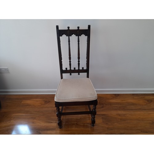 490 - An Ercol 'Old Colonial' extending Dining Table, together with four Ercol 'Old Colonial' dining chair... 