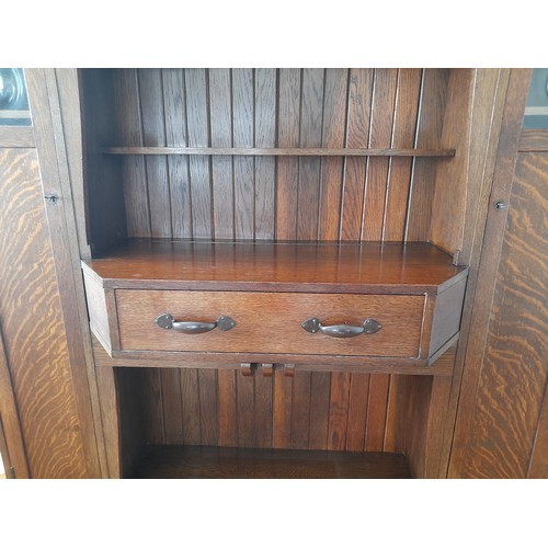 488 - A Liberty & Co Arts and Crafts oak 'Hathaway' Dresser, c1900, with central shelf and drawer flan... 