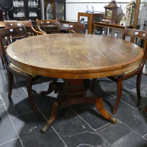 436 - An early 19thC rosewood circular tilt-top Breakfast Table, on brass-inlaid concave platform raised o... 