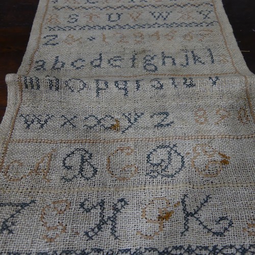 174 - An early Victorian needlework sampler, dated 1844, worked with coloured threads on a linen ground, w... 