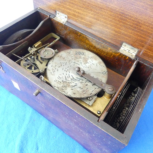 123 - A Thorens Disc Music Box, early 20th century, with clockwork movement, in a wooden case with two com... 