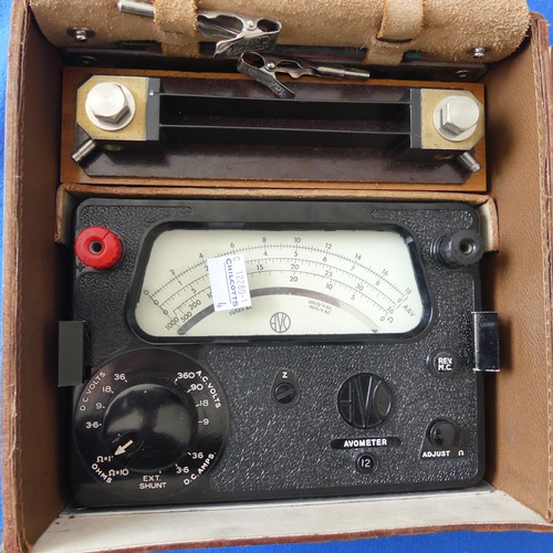 143 - An AVO (Ampere, Volt and Ohm) Meter, Model 12, in leather case with accessories.