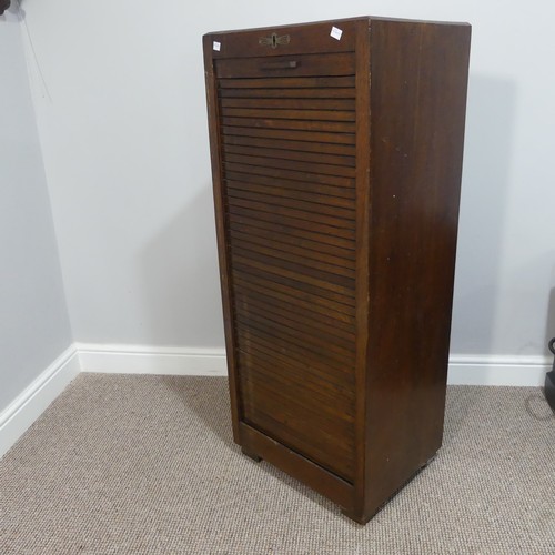 528 - An early 20thC oak pedestal Filing Cabinet, with locking full tambour front exposing the nine tray s... 