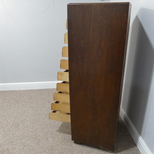 528 - An early 20thC oak pedestal Filing Cabinet, with locking full tambour front exposing the nine tray s... 