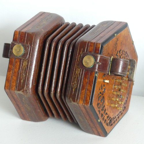 145 - An early 20thC Concertina by Lachenal & Co., serial no. 31235, walnut mounted with 60 buttons (3... 