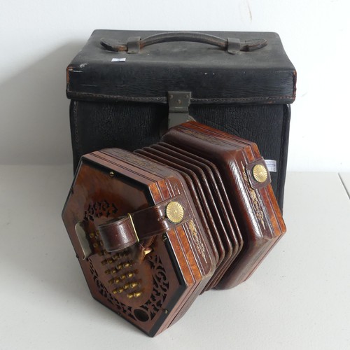 145 - An early 20thC Concertina by Lachenal & Co., serial no. 31235, walnut mounted with 60 buttons (3... 