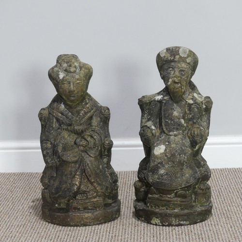 547 - Garden statuary; a pair of Oriental style reconstituted stone figures, of a man and a woman in Orien... 