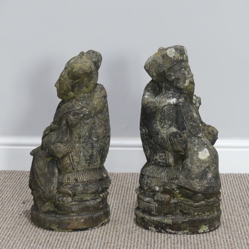 547 - Garden statuary; a pair of Oriental style reconstituted stone figures, of a man and a woman in Orien... 