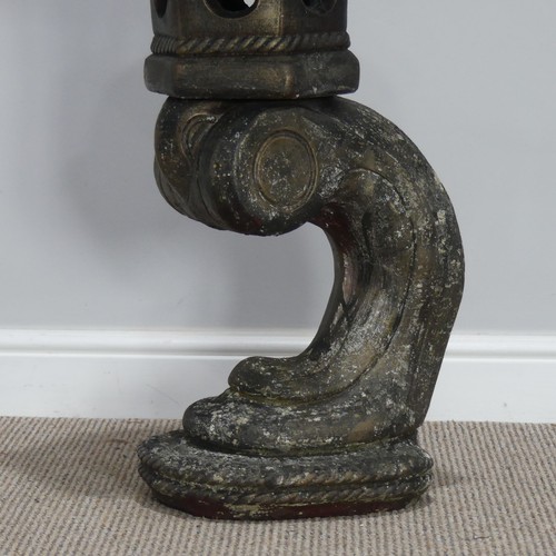 550 - Garden statuary; a reconstituted stone Oriental style pagoda, on an arched support, 88cm high... 