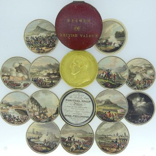 'Record of British Valour'; A George III gilt metal Picture Box Medal, designed by Edward Orme commemorating 'The Battles of The British Army in Portugal, Spain and France 1808-1814', pub. 1815, the obverse bearing the bust of the Duke of Wellington, the reverse an angel writing a tablet 'Record of British Valour' above 'Picture Medal Edwd. Orme. Direx Bond of London', the interior containing thirteen hand coloured aquatint discs of the battles, all in a red leather presentation case with gilt lettering, the medal 7.5cm diameter.