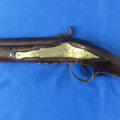34 - An 18th century English wild fowling percussion shot gun, with ramrod and brass mounts, signed Josep... 