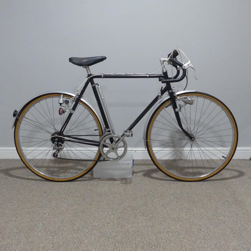 144 - An Arkay gentlemen's touring Bicycle, circa 1970's, with black frame, aluminium guards, Shimano Tour... 