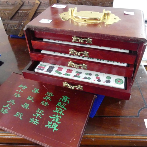 532 - A 20thC cantilever Sewing Box, with carved decoration and contents, 41cm wide, together with a wood ... 