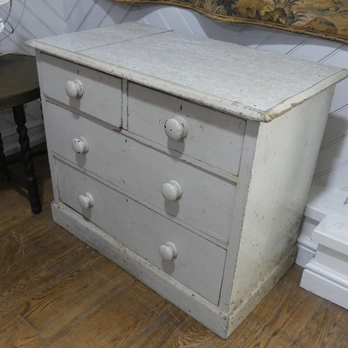 538 - A Victorian white painted pine Chest of Drawers, with two short and two long drawers, graduated in s... 