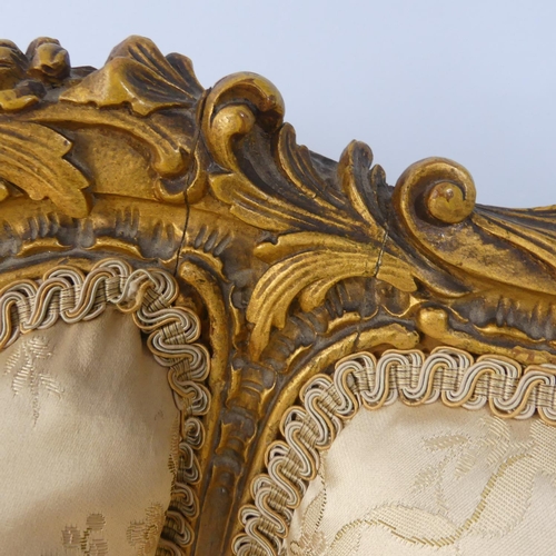 542 - A 19thC French gilt painted wood framed Salon Chair, with ornate carving and moulding to the the fra... 