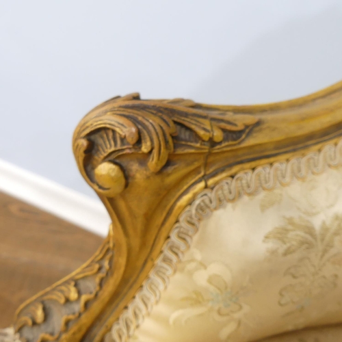 542 - A 19thC French gilt painted wood framed Salon Chair, with ornate carving and moulding to the the fra... 